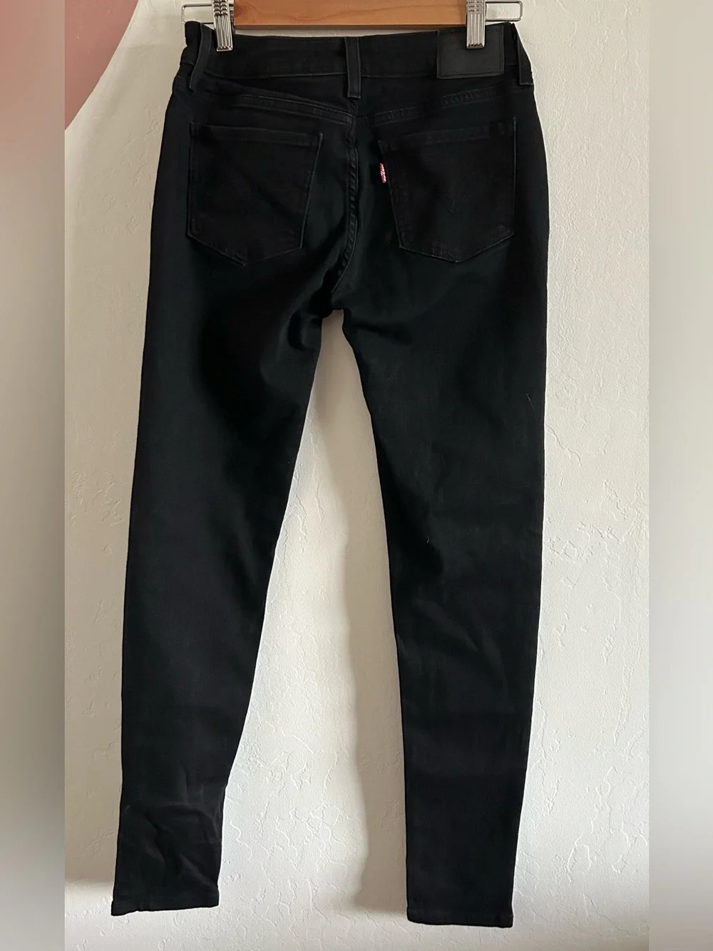 Levi’s Super Skinny size 28 black jeans with faux leather front panels